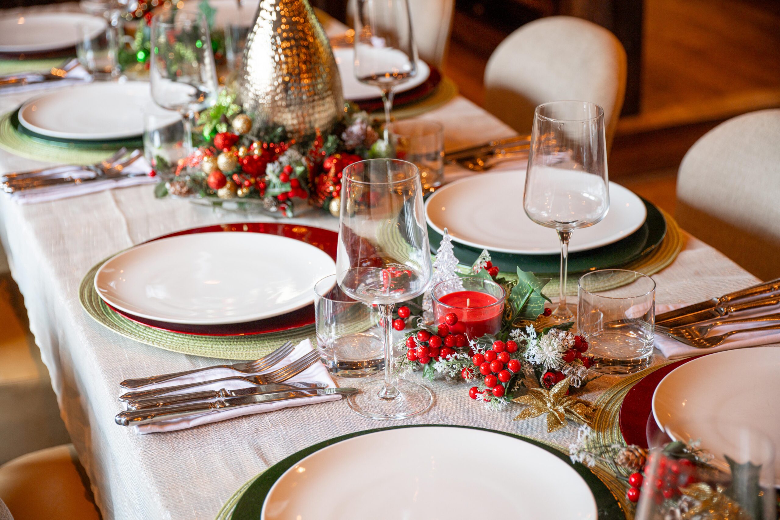 Festive table setting with red and gold decorations, ready for Christmas dining at The Three Horseshoes Inn, Lickfold.