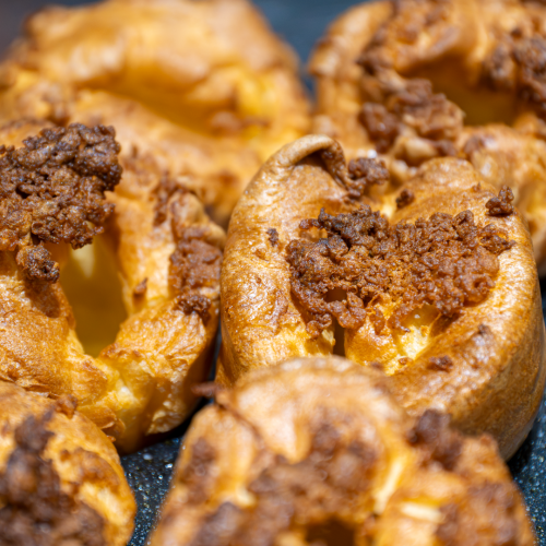 Golden, crispy Yorkshire puddings served at The Three Horseshoes Inn, Sunday roast in Lickfold