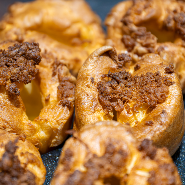 Golden, crispy Yorkshire puddings served at The Three Horseshoes Inn, Sunday roast in Lickfold